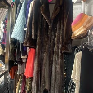 Dark chocolate Mink coat. Definitely a large and long. Absolutely beautiful